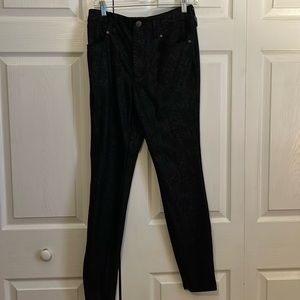 Black skinny pants, with silver reptile reflected finish